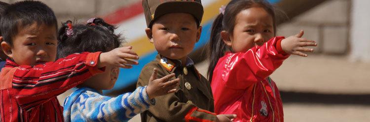 children saluting in north korea military