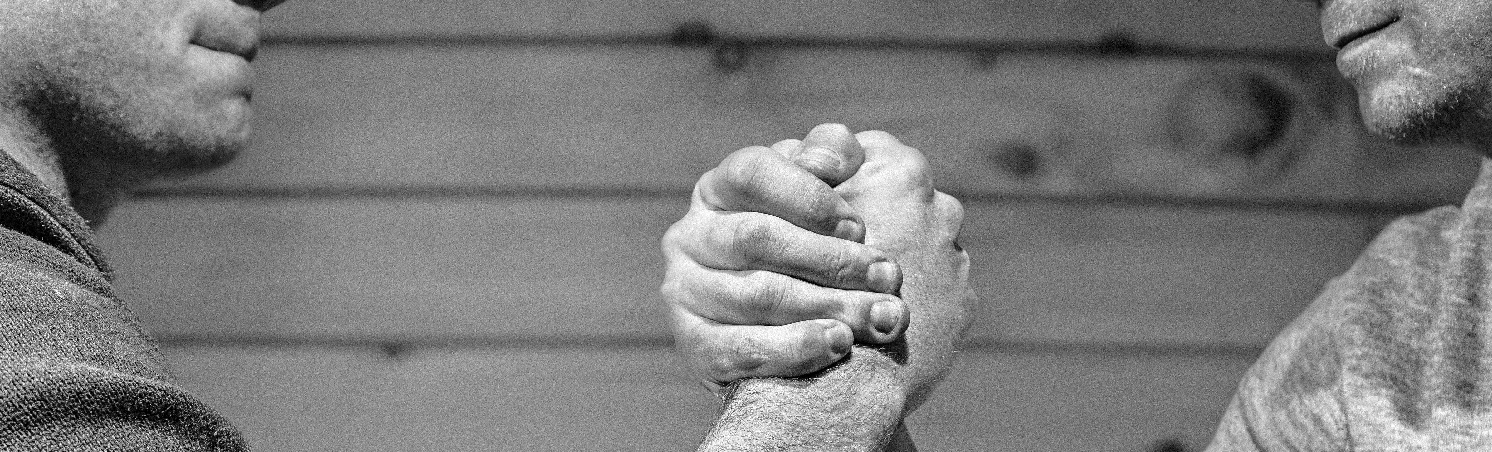 men arm wrestling