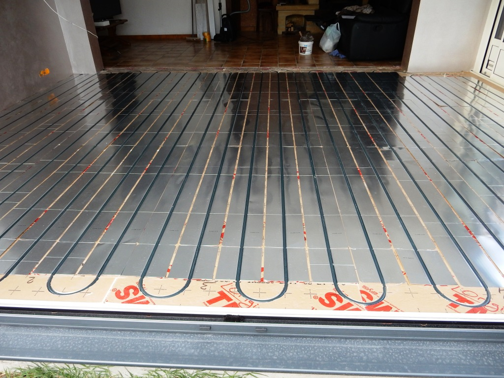 Plancher chauffant pour véranda fini avant pose du parquet
