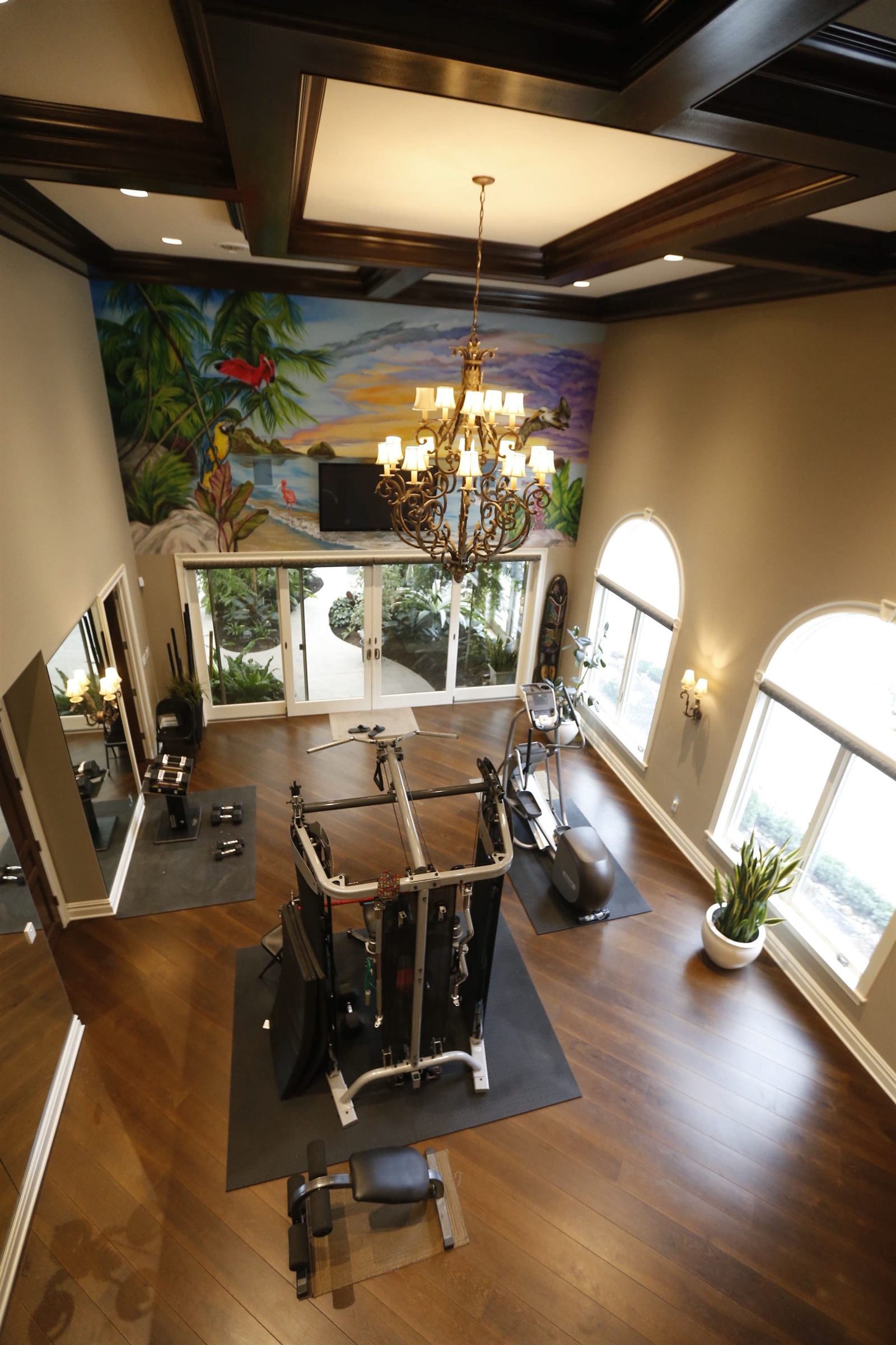 gym room with chandelier