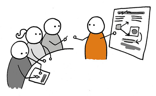 orange stickman cartoon pitching a user experience strategy to a team