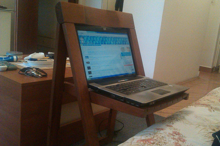 A computer sitting inside of a chair
