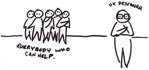 An expert ux designer standing alone watching everyone else in a crowd