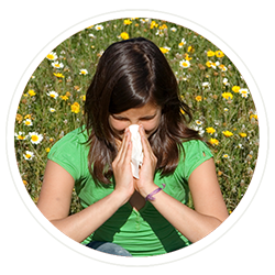 Woman Sneezing Outdoors