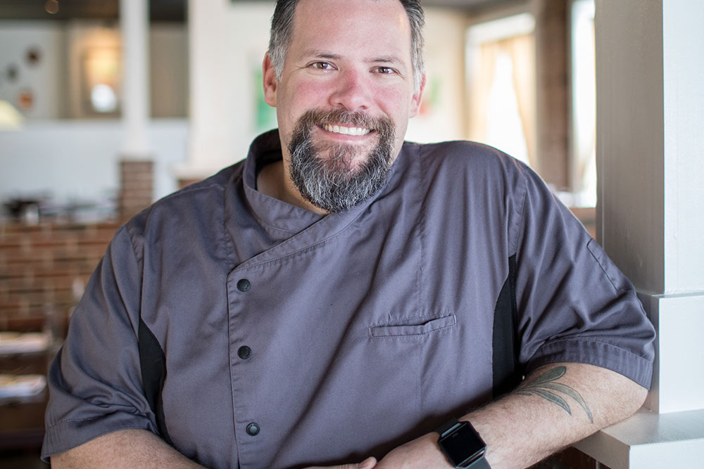 Thompson has been in and around the kitchen since he was 16 years old, working at corporate restaurants throughout his high school and college days. (Photo: Valerie Grant)