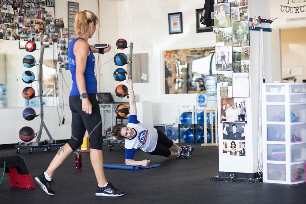 Exercises at Fitness Protection Program involve body weight, dumbbells, medicine balls, steps, plyometrics and other small equipment, as well as some cardio. Classes are good for all fitness levels, from newbie to athlete. (Photo: Valerie Grant)