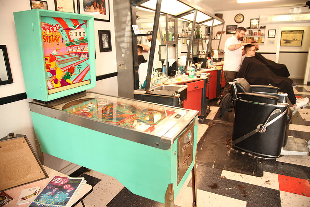 In a strange sort of dichotomy between the nostalgic and trendy, barber shops are offering a setting that reminds men of the places their fathers or grandfathers brought them. (Photo: Marc Rains)