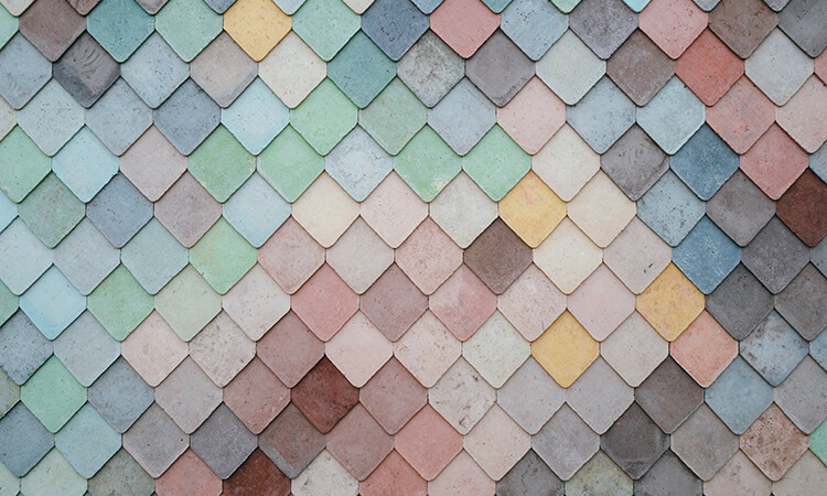 Close up of coloured triangular tiles