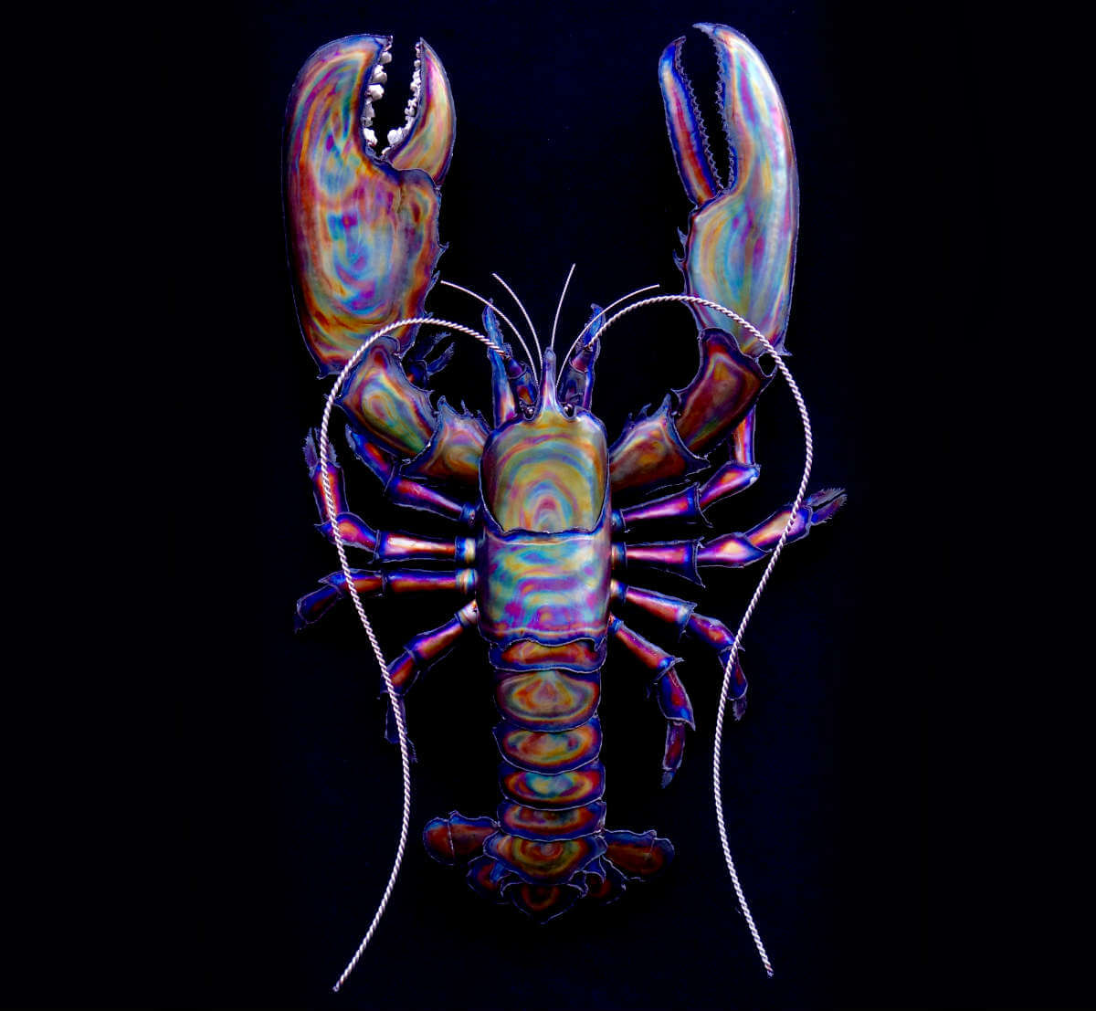 Metal striped lobster sculpture