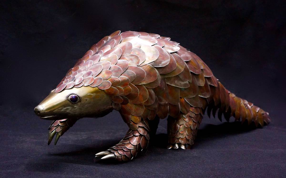 Metal pangolin sculpture