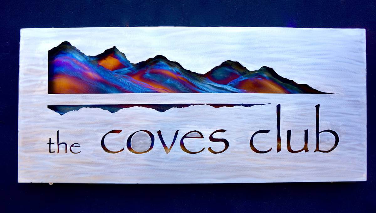 Metal coves club sign