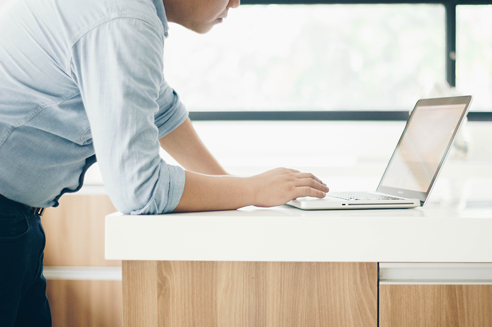 person using laptop