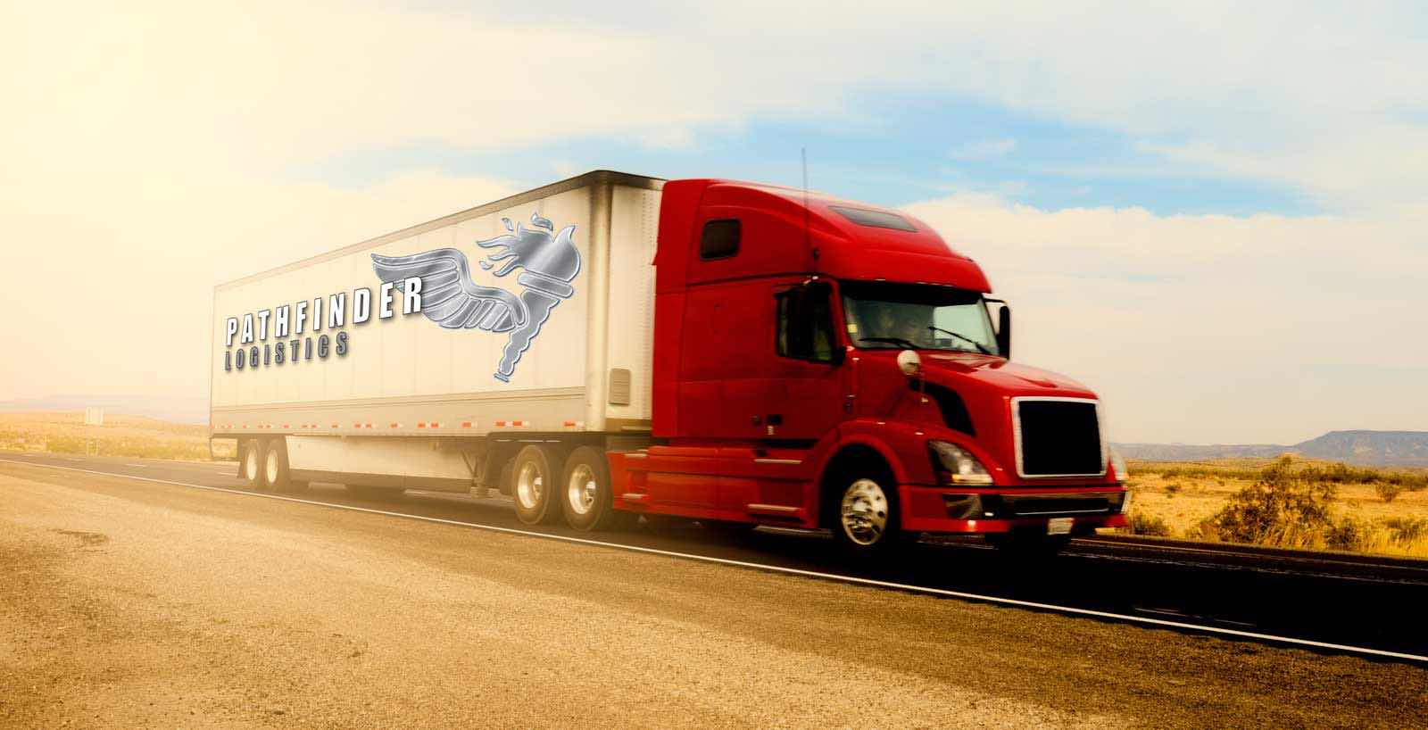 Photo of Pathfinder Logistics Truck Driving On Road